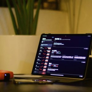 Tablet displaying stock market trends with a focus on financial apps.